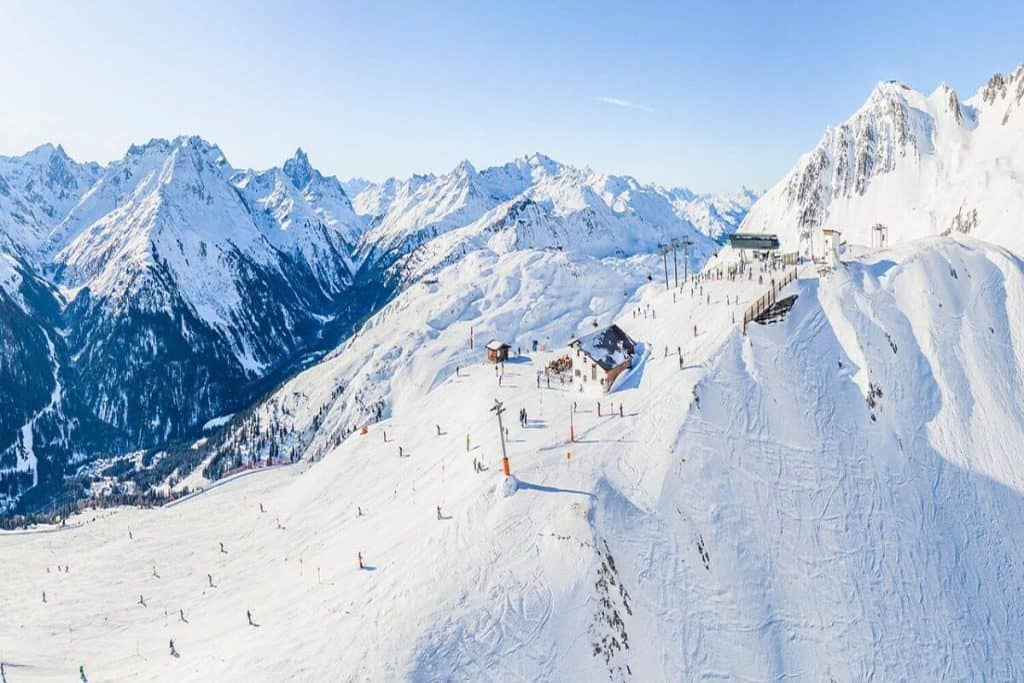 Swiss Alps ski and snowboard slopes with chalets