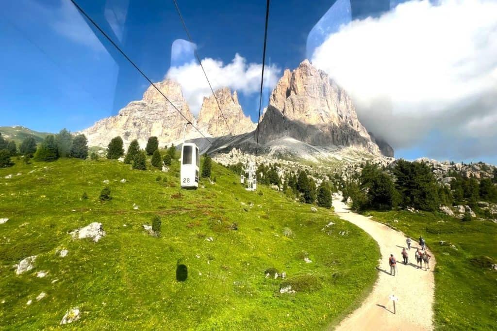 dolomites in summer sassolungo cable car at passo sella